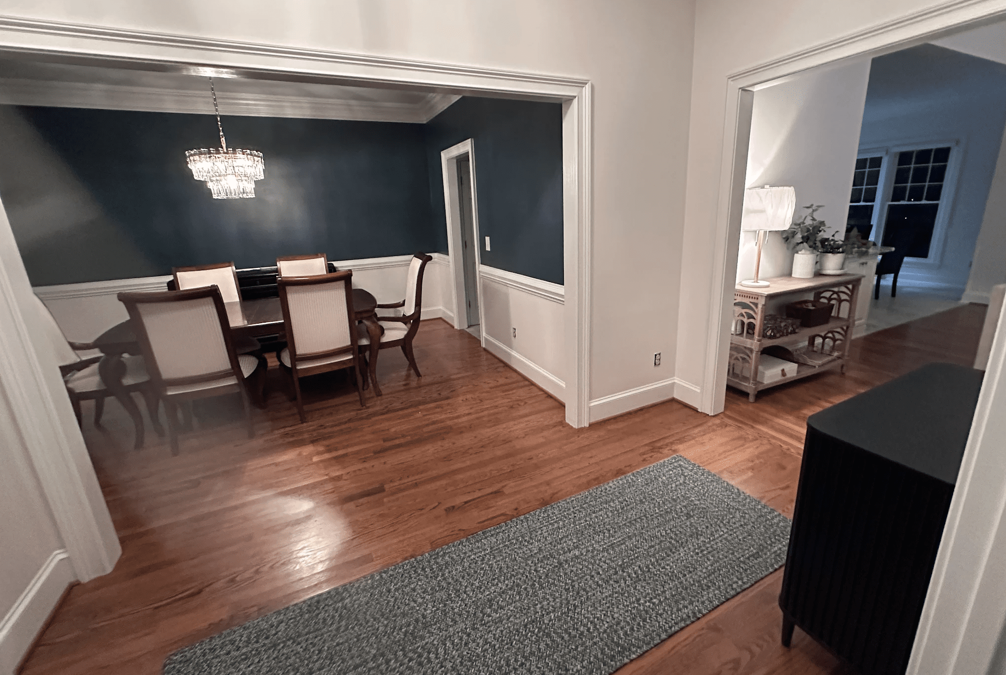 Interior painters in Mooresville NC completed sitting room painting project with dark wall color