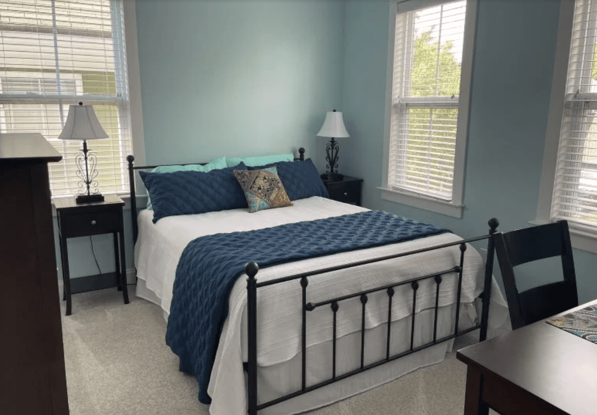 Professional interior painters in the Mooresville area painting bedrooms and living spaces